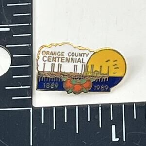 Orange County Centennial 1889–1989 Lapel Pin Gold Tone City Skyline Orange Badge